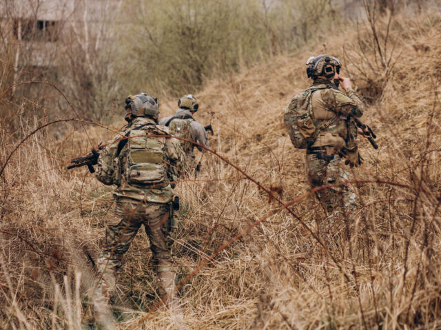 Army soldiers fighting with guns and defending their country